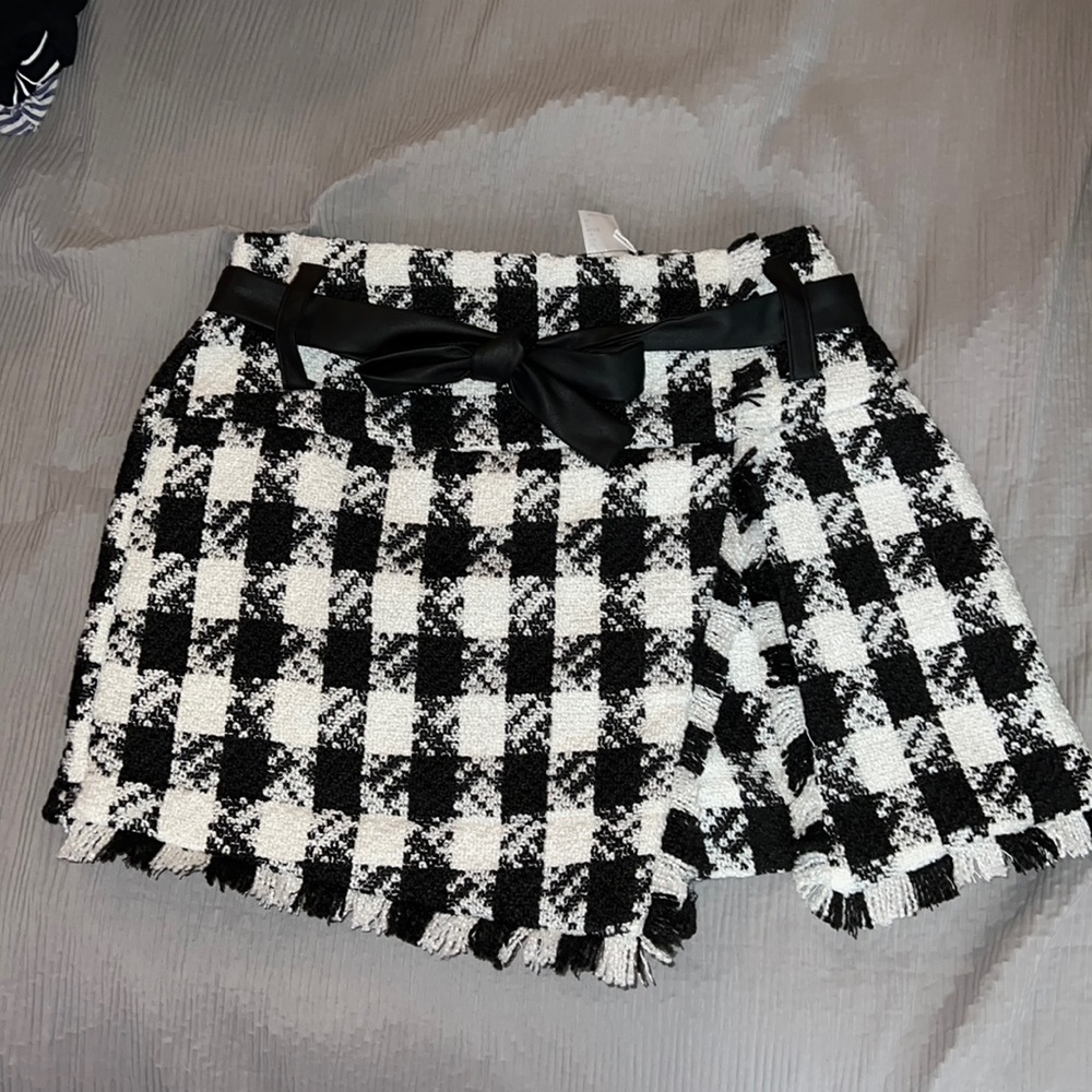 Black and white checkered skort. BRAND NEW NEVER WORN